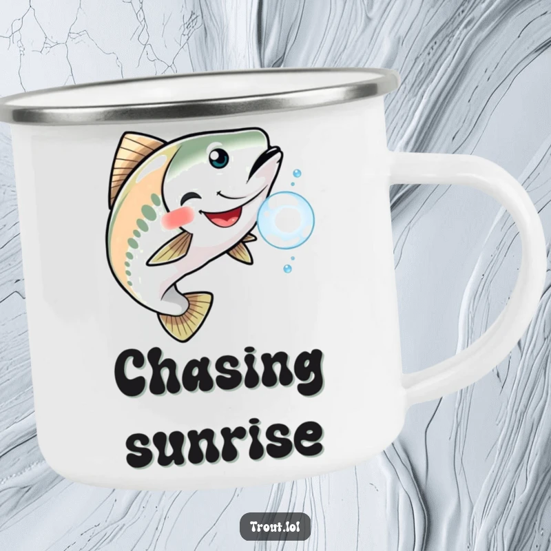 Funny camping mug showing a grinning trout playfully chasing a shimmering bubble, durable and humorous for outdoor fun.