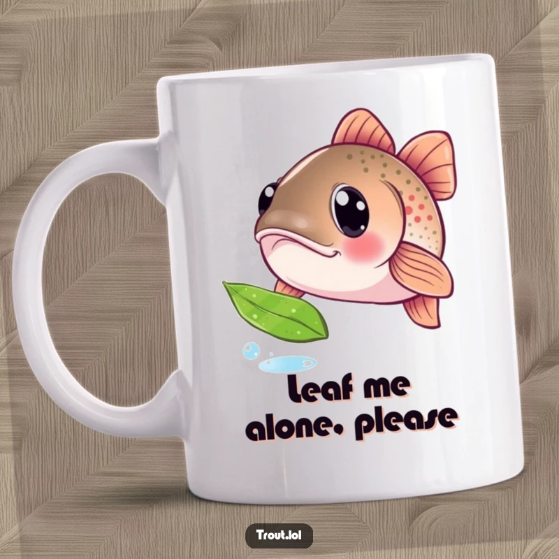 Funny mug with a curious trout's wide eyes fixated on a floating leaf, showcasing a moment of gentle wonder in nature's simplicity.